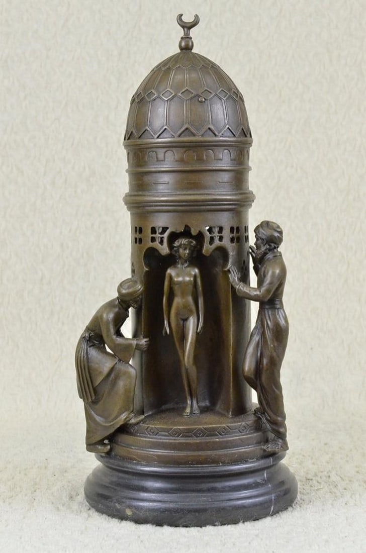 Peeping Ali Bronze Sculpture: Peeping Ali Bronze Sculpture This bronze shows an oriental bath house with a cupola on the roof of which is a half moon. At the entrance to the bathing place, two Arab men and try a look