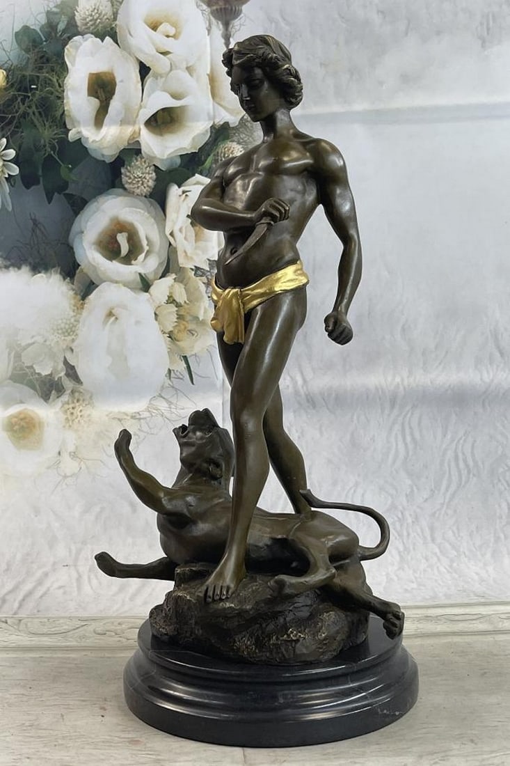 Young Boy Killing Cougar Bronze Sculpture: Young Boy Killing Cougar Bronze Sculpture Stabbed Leopards is shown giving his last snarl. Youth confident but cautious, has just removed dagger. This piece won first gold medal at