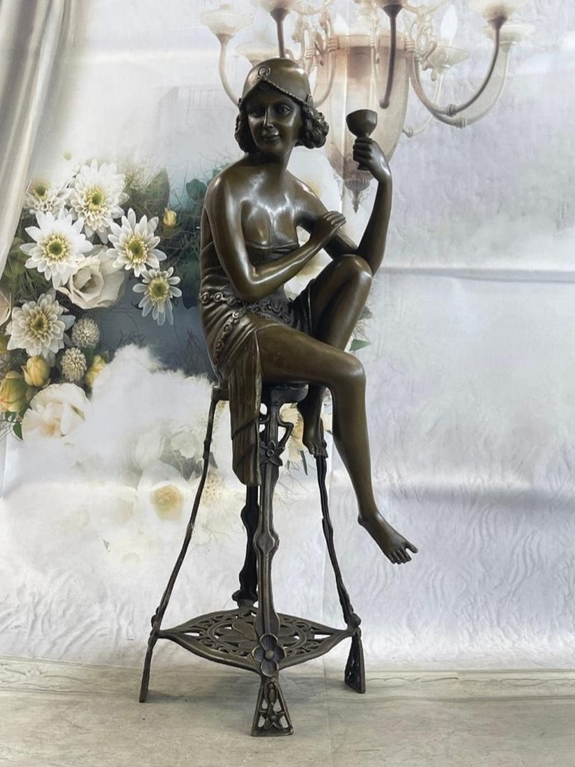 Flapper Girl on Chair w/ Wine Champagne Glass Bronze Figure: Flapper Girl on Chair w/ Wine Champagne Glass Bronze Figure Any fan of the Roaring 20's, Jazz and F. Scott Fitzgerald will adore this stunning Flapper. They were considered to be the