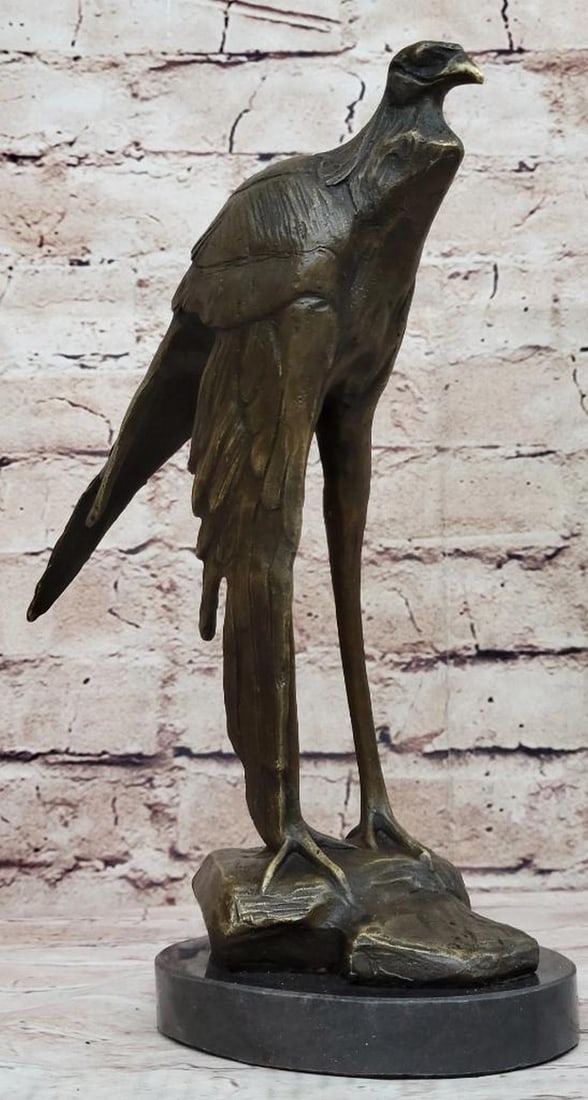 Moigniez Inspired Long Legged Bird of Prey Bronze Sculpture - 10" x 9": Moigniez Inspired Long Legged Bird of Prey Bronze Sculpture - 10" x 9" This Bronze Piece is signed by Moigniez a famous French artist. This Bronze Sculpture is of a Secretary Bird. Standing t