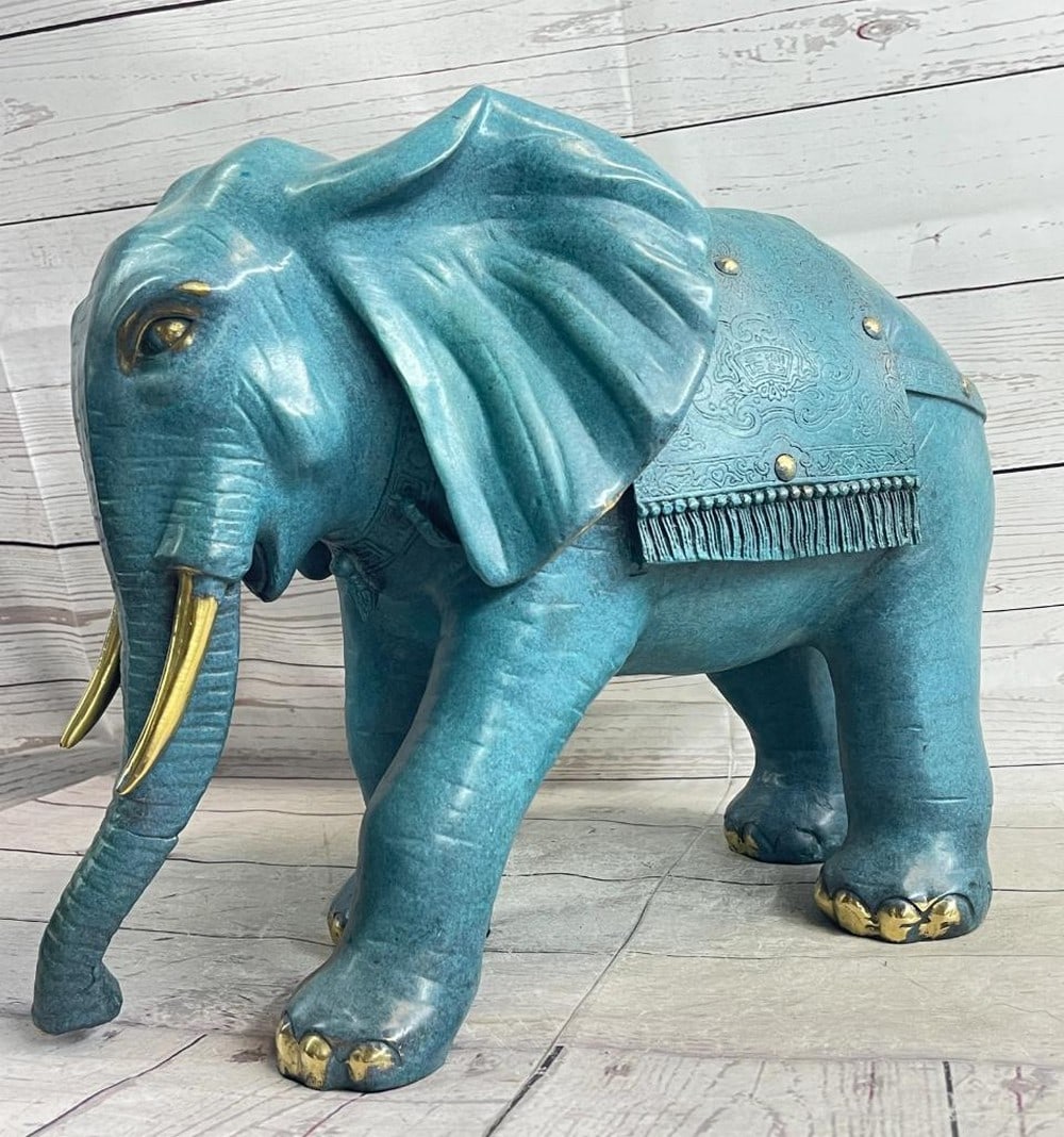 Original Blue Patina Elephant Bronze Sculpture - 12" x 16": Original Blue Patina Elephant Bronze Sculpture - 12" x 16" The members of an elephant clan can be imagined on the banks of a watering hole in the hot plains of Africa. Reaching the final dest