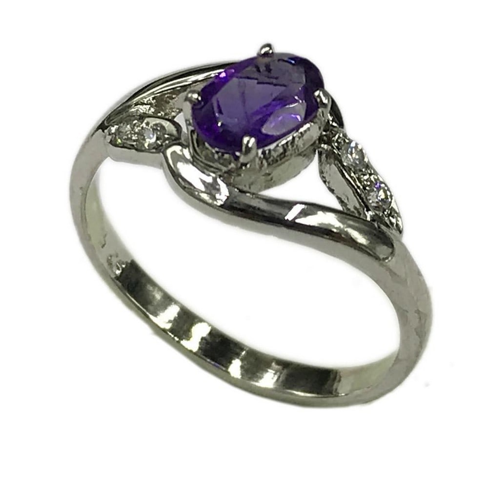 Sterling Silver Amethyst Stone Ring - Size 8: Sterling Silver Amethyst Stone Ring - Size 8 Elevate your style with our exquisite ring, a dazzling fusion of elegance and sophistication. Adorned with shimmering zirconias that dance in the light,