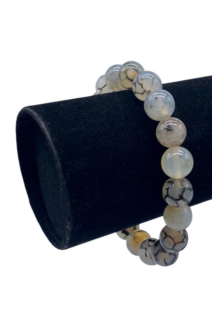 7.5" NATURAL POLISHED "DRAGON EYE" 10MM AGATE GEMSTONE BANGLE BRACELET: 7.5" Natural Polished "Dragon Eye" 10mm Agate Gemstone Bangle Bracelet. Each Polished Bead Has Crazing Tones Displaying The Resemblance To The "Dragons Eye" In Mythological Times.