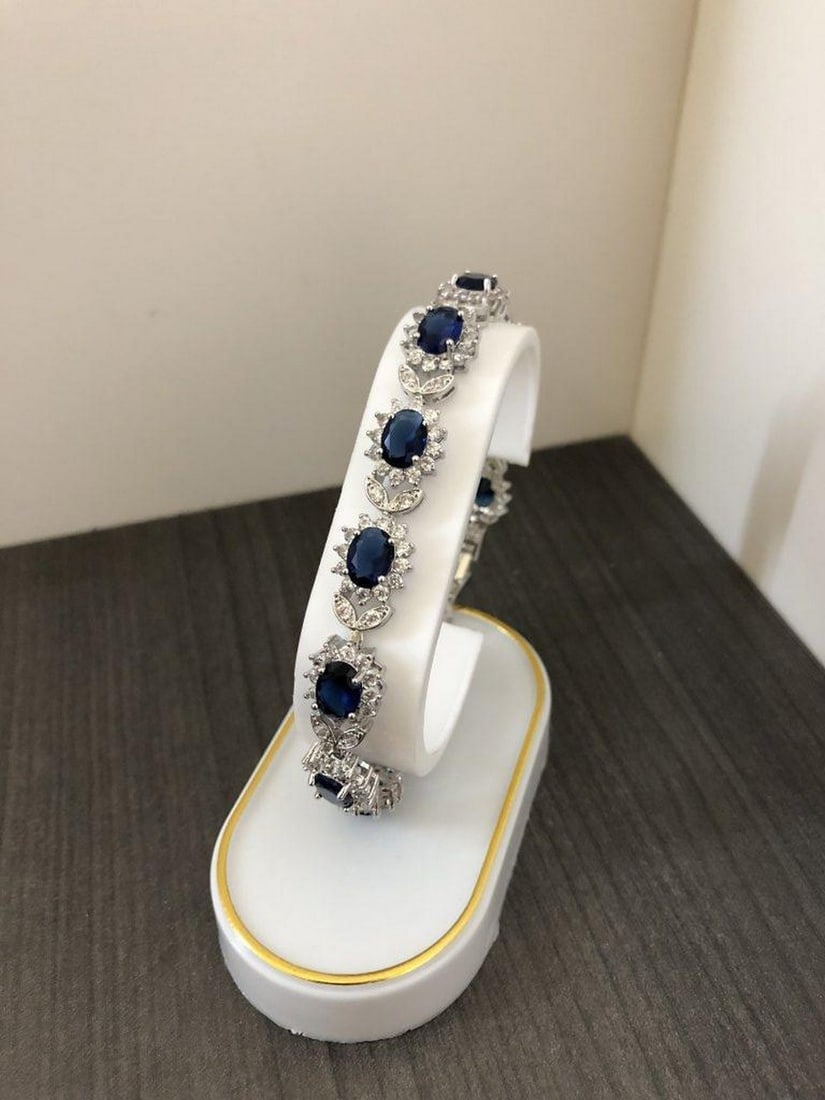 Ladies 925 Silver Bracelet Lined with Semi-Precious: Ladies 925 Silver Bracelet Lined with Semi-Precious Blue Gemstones. View Photos For Further Details.