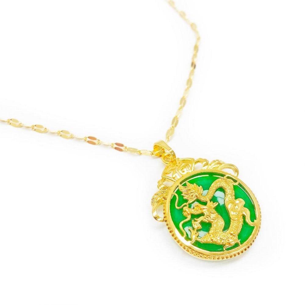 Chinese Carved Green Jade In Gold Dragon Mount Necklace: Chinese Carved Green Jade In Gold Tone Dragon Mount Pendant. The Pendant Is Accompanied With Necklace Shown In The Photos.