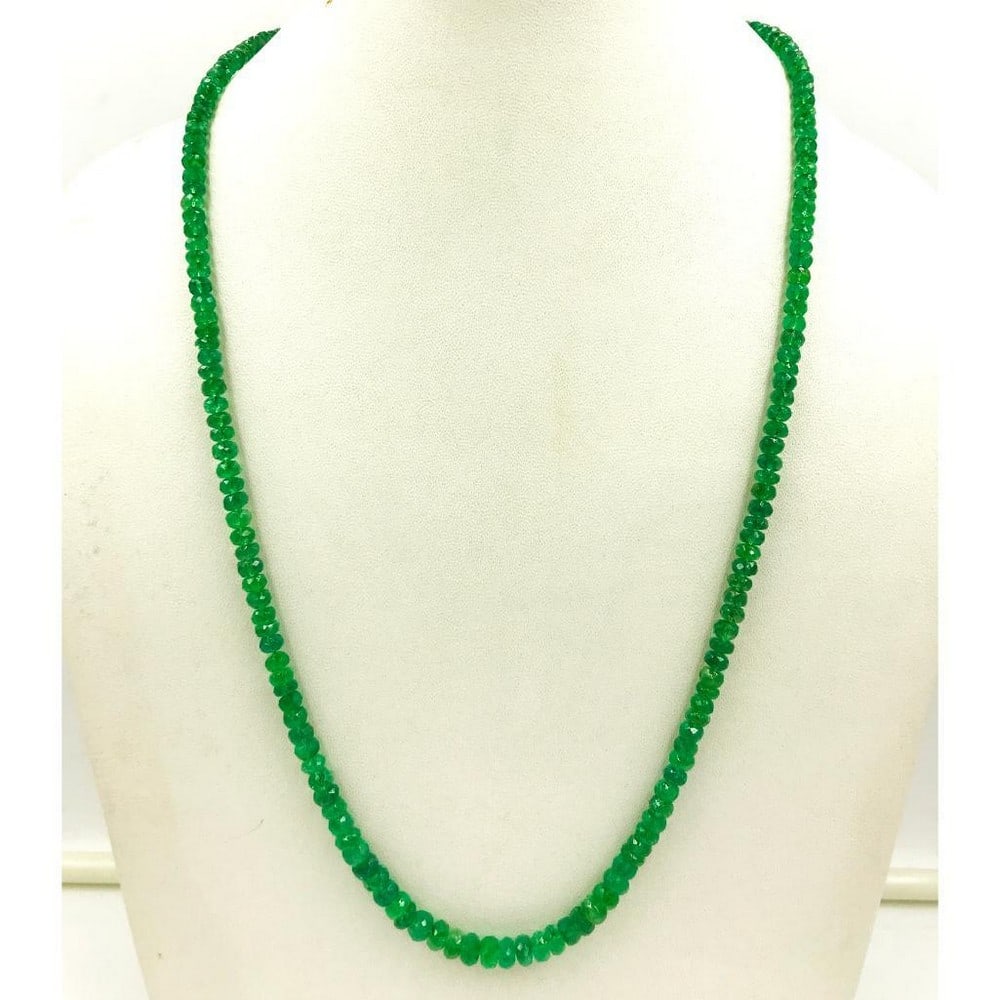 Emerald Faceted String Bead Necklace: Emerald Faceted String Bead Necklace Diameter: 4.4 to 5.7 mm Length of Necklace: 45 cms Weight In Carats: 84.44 View Photos For Further Details.