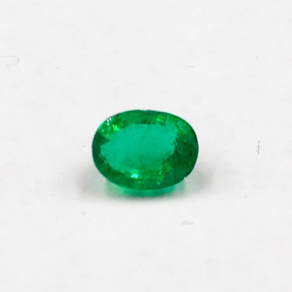 Oval Shaped Emerald: Oval Shaped Emerald For many, emerald is considered to be the symbol of rebirth. It is also believed to represent good fortune, youth, balance, growth, peace, and foresight Size- 6.2 x4.7 mm, 0.86