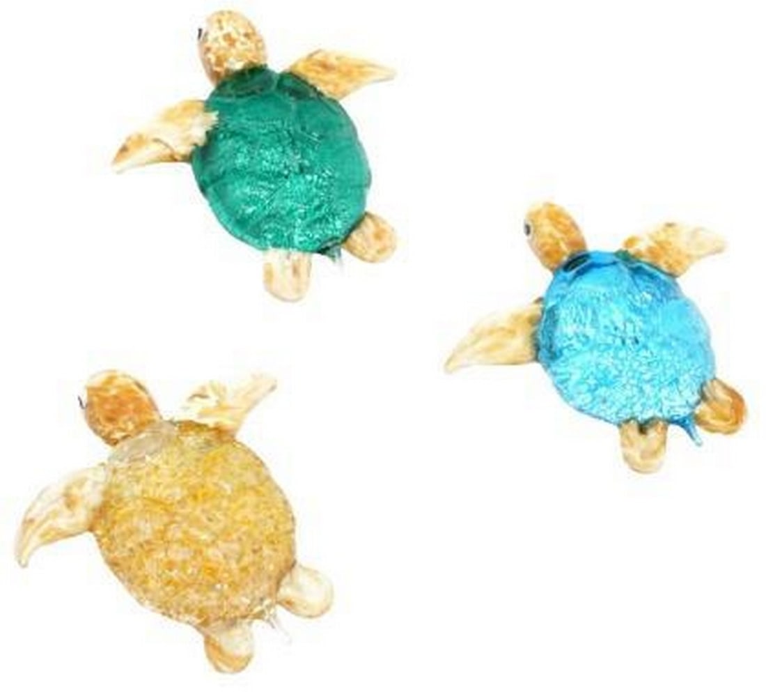 Turtle Trio: Murano Glass Serenity: Turtle Trio: Murano Glass Serenity This enchanting set of three mini Murano glass turtles brings a sense of calm and harmony to any space. Each turtle is hand-blown with expert craftsmanship,