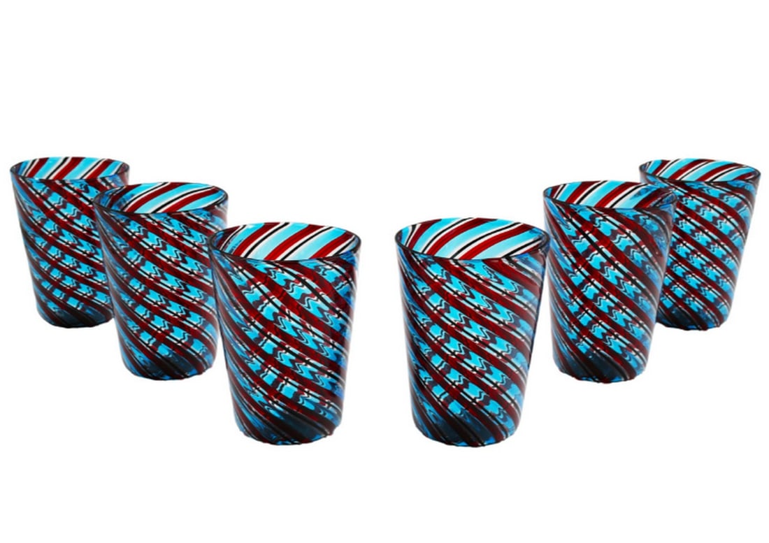 Set of Six Blown Glass Drinking Glasses with Twist Design: Set of Six Blown Glass Drinking Glasses with Twist Design This set of six blown glass drinking glasses features a captivating twist design that adds dynamic movement and texture to each piece.