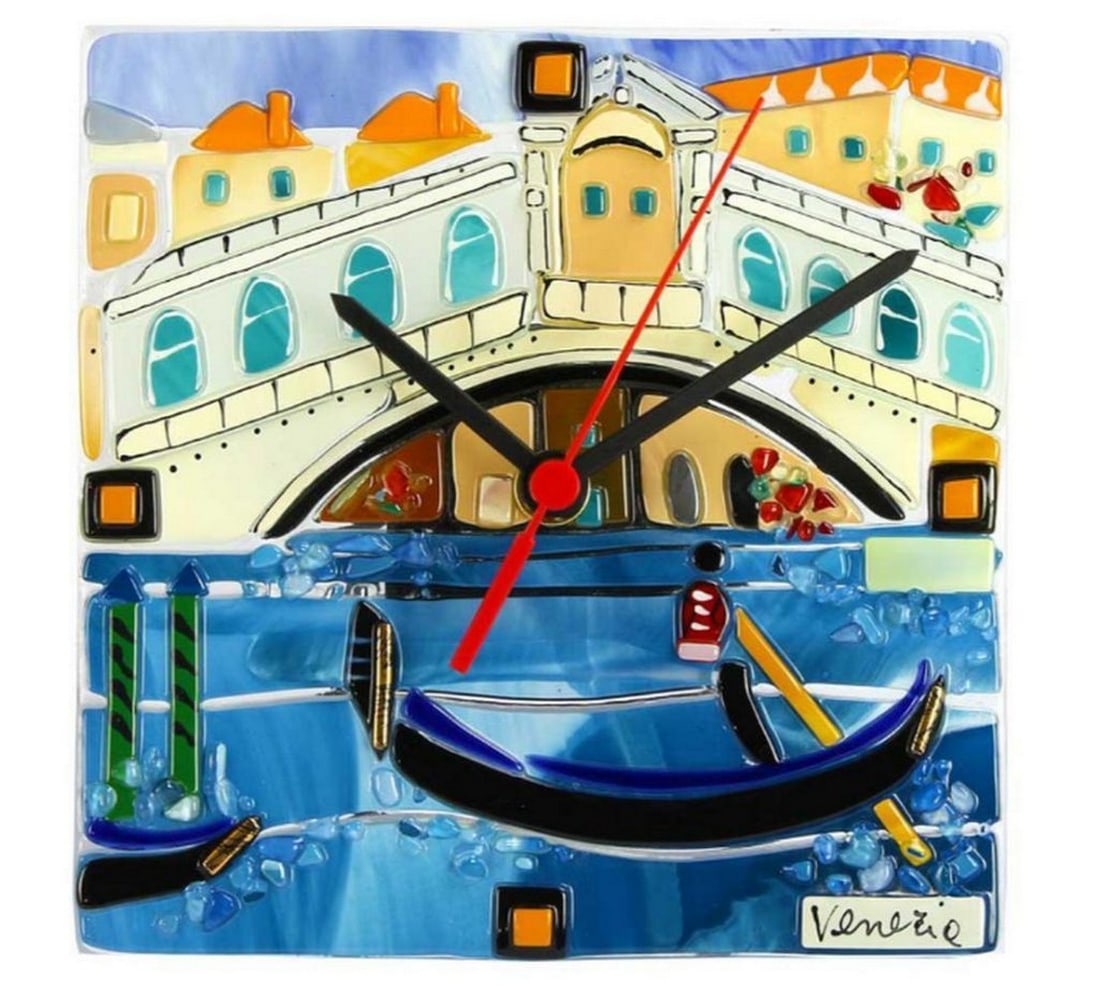 Table Clock – Rialto Bridge Murano Glass Design: Table Clock – Rialto Bridge Murano Glass Design This handcrafted Murano glass table clock is inspired by the iconic Rialto Bridge of Venice. Created using the glass fusing technique, each piece of g