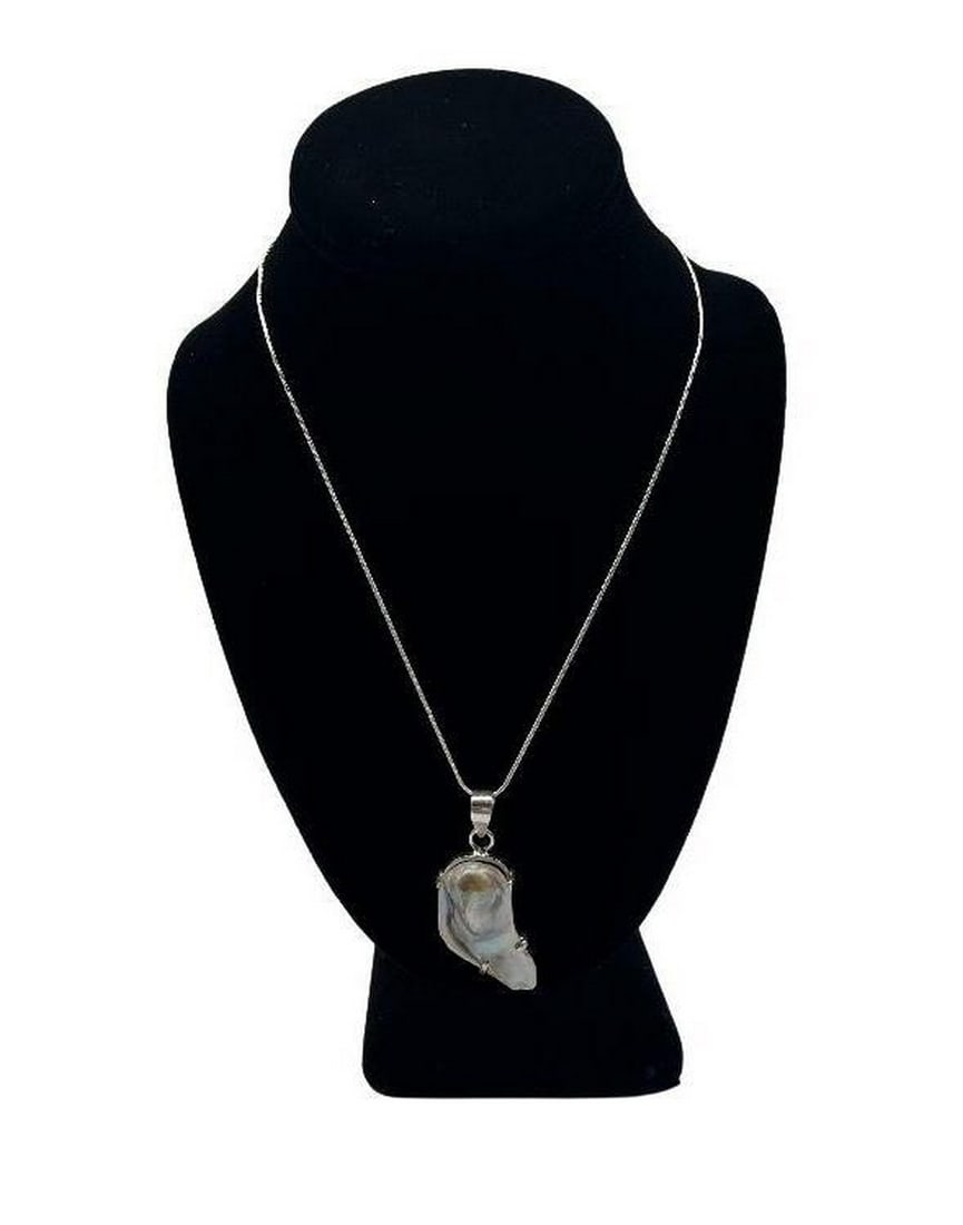 Lavender Biwa Pearl Pendant Necklace: Lavender Biwa Pearl Pendant Necklace This pearl pendant is 1.97" in length hanging on a 925 Sterling silver chain. It is a white pearl with a lavender tint. Chain Length: 18" View Photos F