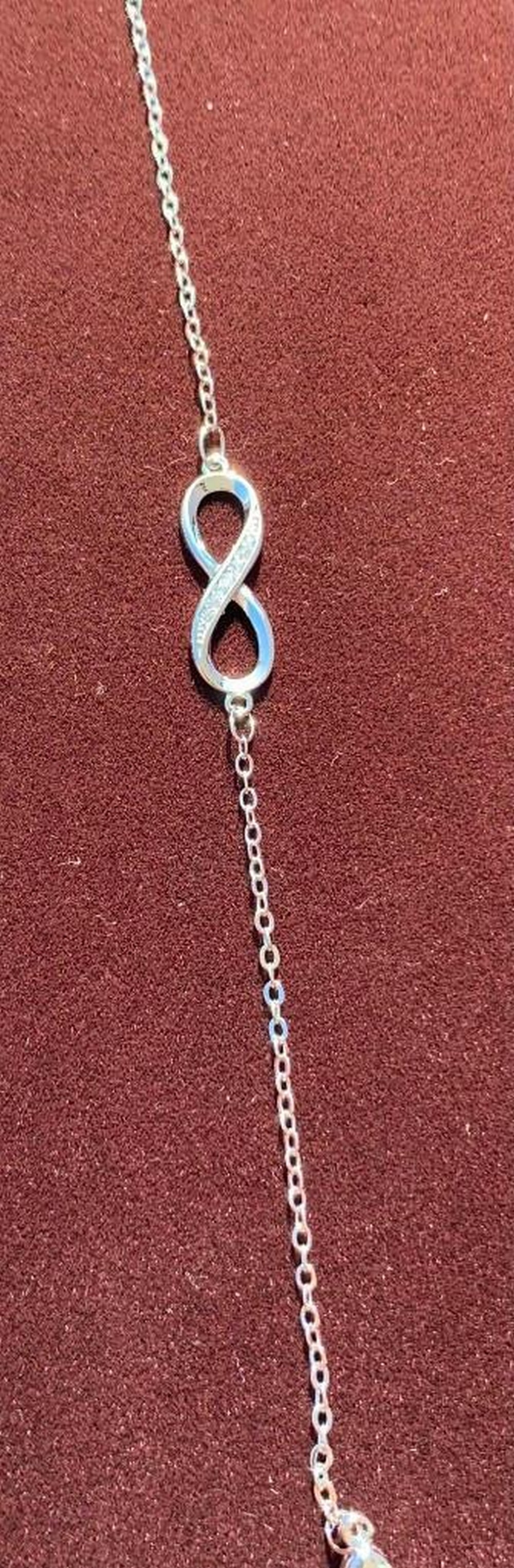 Endless Elegance Bracelet: Endless Elegance Bracelet This bracelet features a beautifully crafted sterling silver infinity symbol, representing eternal love, unity, and limitless possibilities. Its sleek and minimalist design