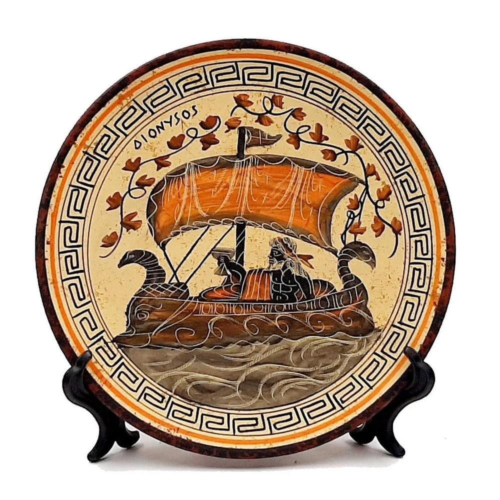Greek Ceramic Plate – Dionysus on Ship Replica: Greek Ceramic Plate – Dionysus on Ship Replica This 20 cm Ancient Greek–inspired ceramic plate reproduction reflects artistic styles of the 5th and 6th centuries BCE and echoes the storytelling tr