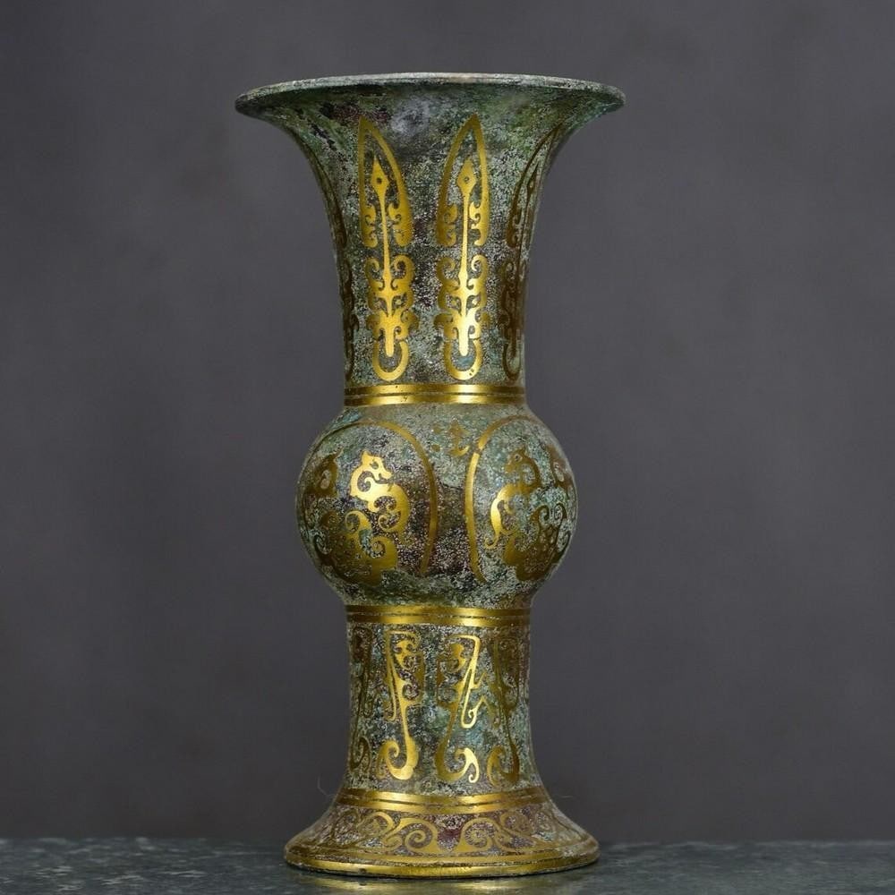 Antique Chinese Inlaid Gold Flower Bronze Ornament: Antique Chinese Inlaid Gold Flower Bronze Ornament This antique Chinese bronze ornament features delicate gold inlay in an intricate floral design, showcasing masterful craftsmanship. The rich patina