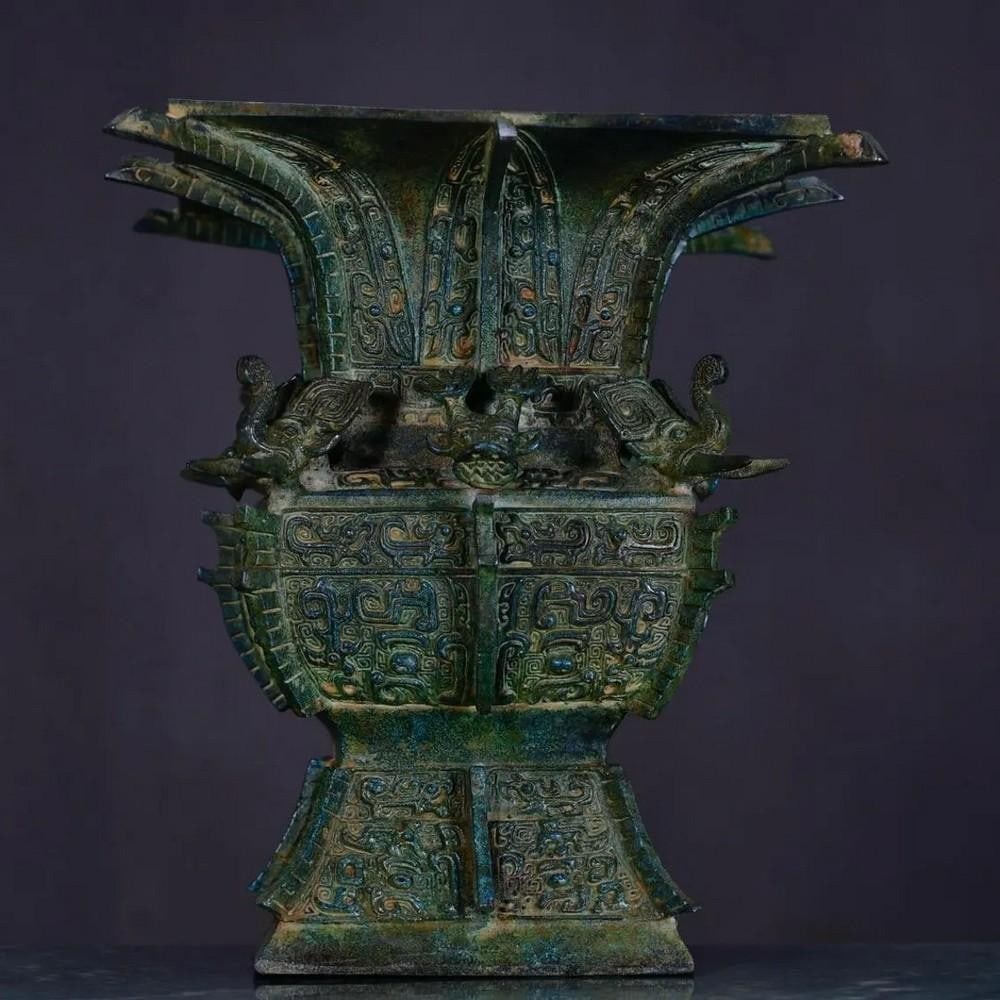 Antique Chinese Bronze Four Elephants Square Statue Ornament: Antique Chinese Bronze Four Elephants Square Statue Ornament This rare handcrafted bronze statue features a square base adorned with four intricately detailed elephants, symbolizing strength, wisdom,