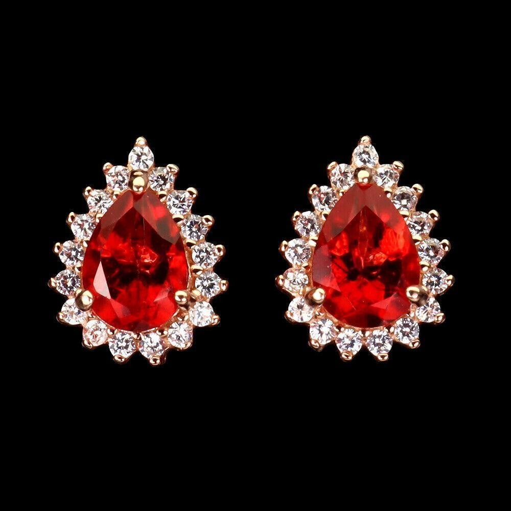 Pear Cut Red Topaz (7x5mm) Rose GP Earrings With White Topaz Crown Mount: Pear Cut Red Topaz (7x5mm) Rose GP Earrings With White Topaz Crown Mount PRODUCT TYPEEARRINGS TYPE OF METAL925 STERLING SILVER PLATE14K ROSE GOLD MAIN STONE: RED TOPAZ OTHER GEMS: WHITE