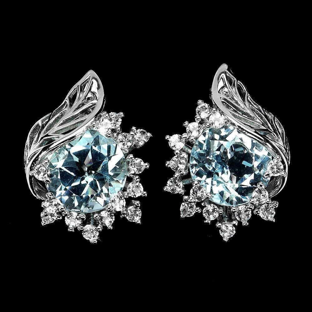 Powder Blue and White Topaz 925 Sterling Silver English Lock Earrings: Powder Blue and White Topaz 925 Sterling Silver English Lock Earrings Metal: 925 Sterling Silver Plate: 14k White Gold Main Stone: Powder Blue Round Cut Topaz View Photos For Further Details