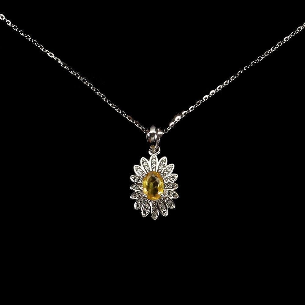 Oval Cut Yellow Sapphire (7x5mm) Center Stone Pendant With White Topaz Crown Pendant: Oval Cut Yellow Sapphire (7x5mm) Center Stone Pendant With White Topaz Crown Pendant TYPE OF METAL: 925 STERLING SILVER PLATE: 14K WHITE GOLD LENGTH: 18 Inches MAIN STONE: YELLOW SAPPHIRE OTHER GEMS: