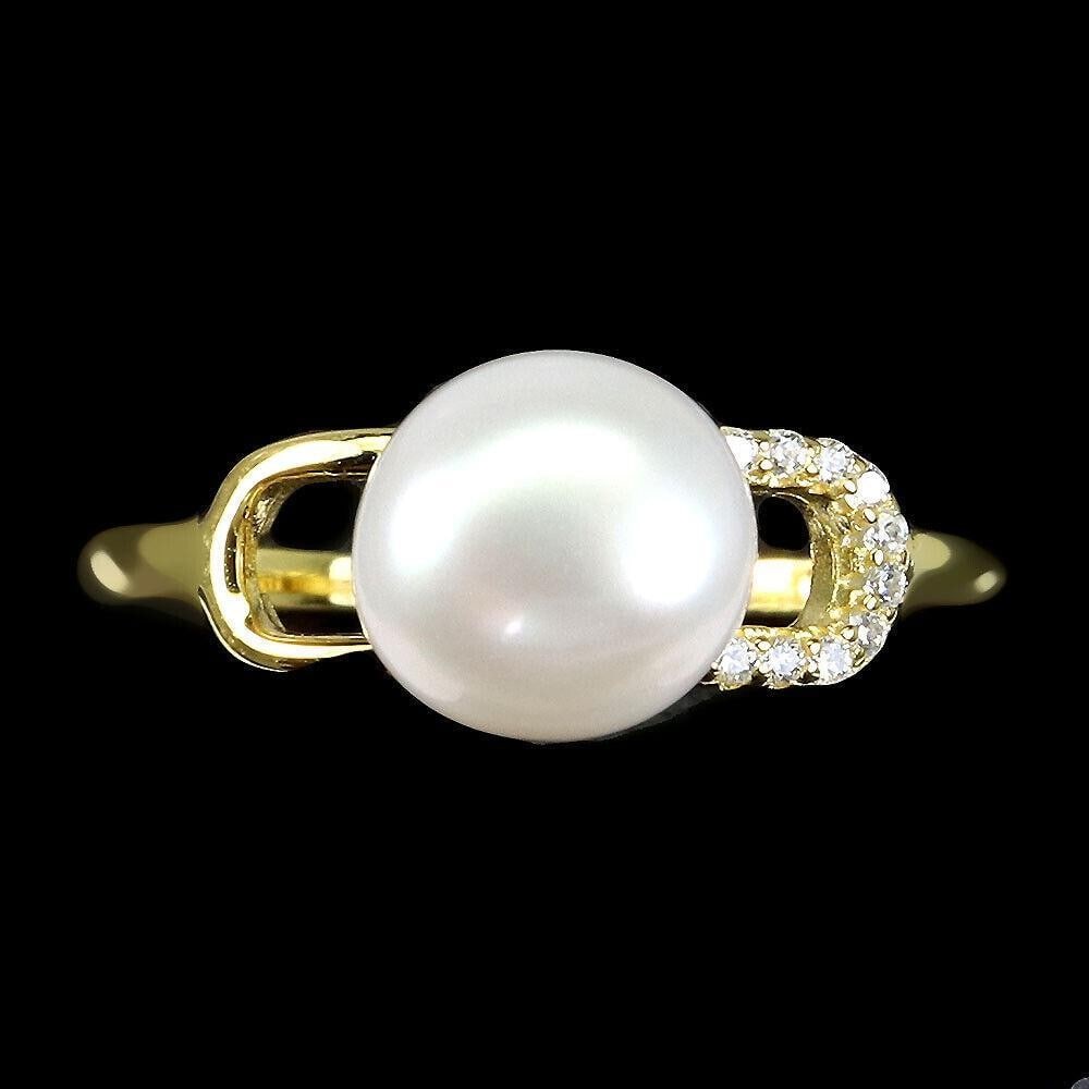 Round White Pearl 8mm Simulated Cz 925 Sterling Silver Ring: Round White Pearl 8mm Simulated Cz 925 Sterling Silver Ring Discover the timeless elegance of our White Pearl Ring, a piece that exudes sophistication and grace. At the heart of this stunning ring is