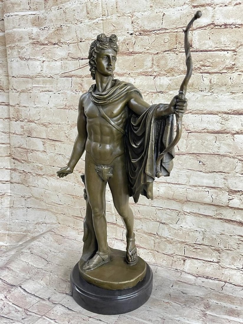 Roman Archer Bronze Sculpture with Marble Base – 22" x 16": Roman Archer Bronze Sculpture with Marble Base – 22" x 16" This bronze sculpture depicts a young Roman man stepping forward from behind a tree, gracefully releasing an arrow while a long cap