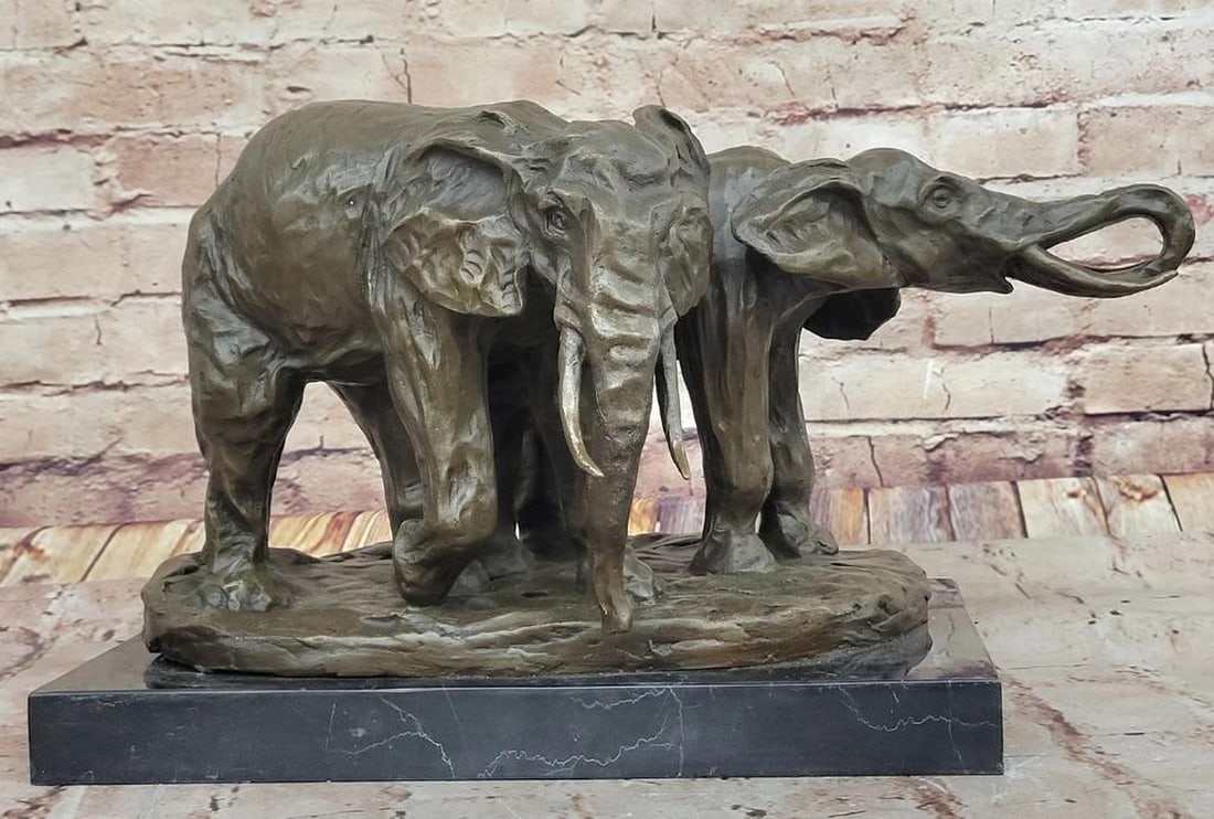 Majestic Resilience" Bronze Elephant Sculpture by Milo - 9.5" x 18: "Majestic Resilience" Bronze Elephant Sculpture by Milo - 9.5" x 18" For centuries, the elephant has been revered as a sacred symbol in Eastern cultures, embodying strength, power, wis