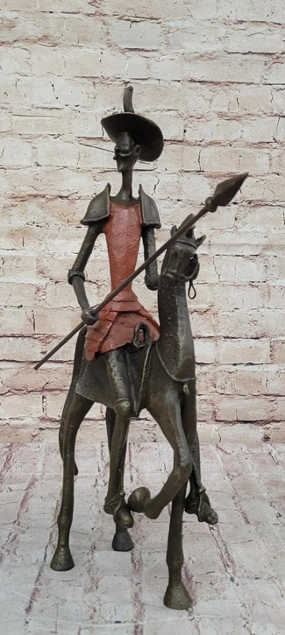 Don Quixote on Horseback Inspired Bronze Sculpture with Red Patina - 18" x 13": Don Quixote on Horseback Inspired Bronze Sculpture with Red Patina - 18" x 13" Immerse yourself in the legendary tale of "Don Quixote" with our exquisite collector edition bronze scul