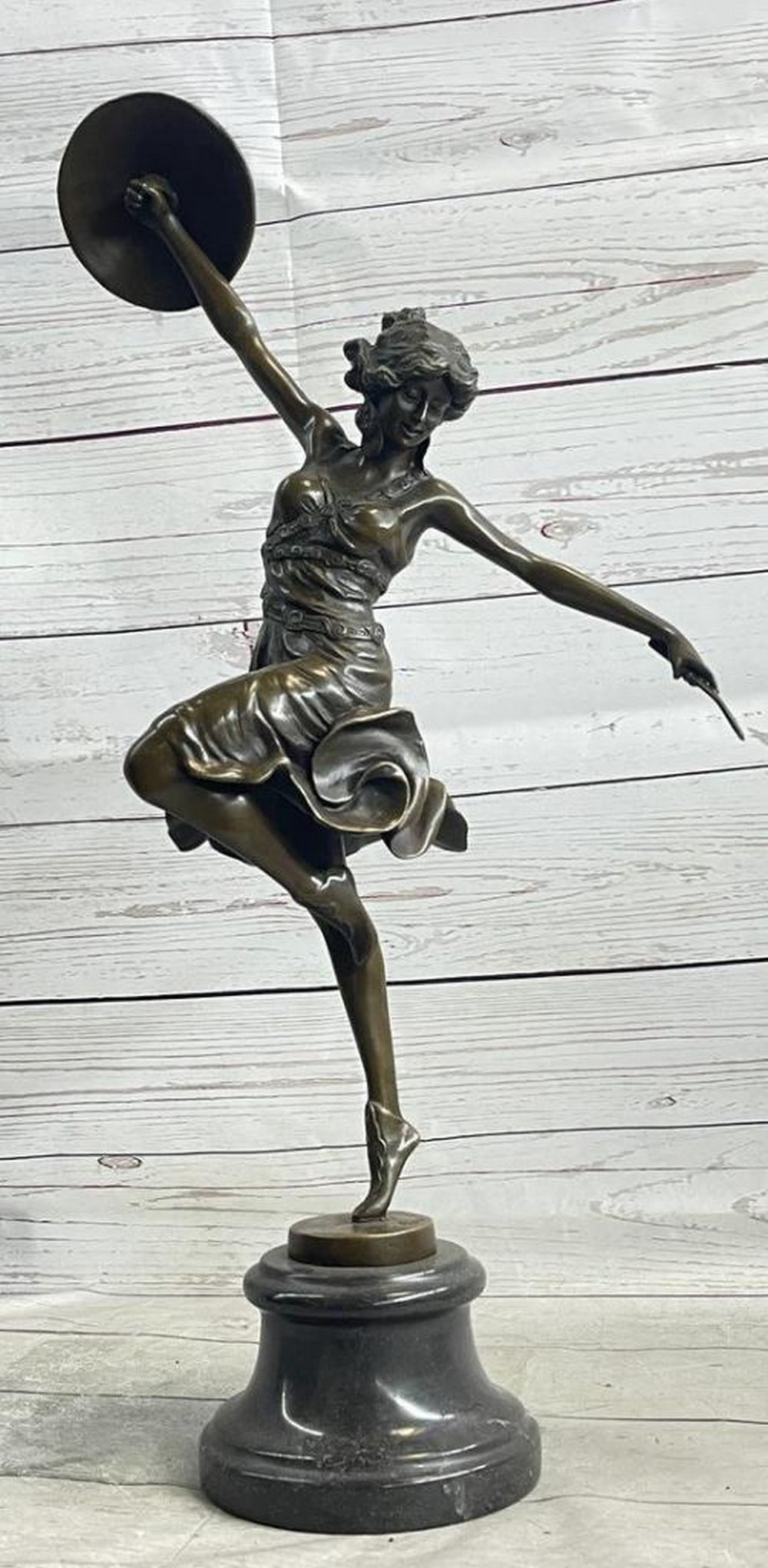 Oriental Dancer with Disc and Dagger' Inspired Bronze Sculpture by Claire Colinet - 20" x 13": 'Oriental Dancer with Disc and Dagger' Inspired Bronze Sculpture by Claire Colinet - 20" x 13" This beautiful bronze sculpture, titled "Oriental Dancer with Disc and Dagger" by