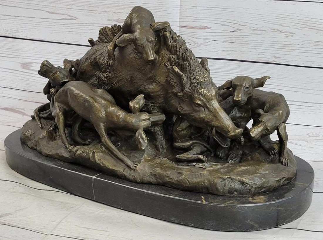 Hunting Dogs Attacking Wild Boar Inspired Bronze Statue - 9.5" x 17.5": Hunting Dogs Attacking Wild Boar Inspired Bronze Statue - 9.5" x 17.5" Experience the thrill of the hunt with this dynamic bronze statue, depicting hunting dogs in the midst of a fierce attac