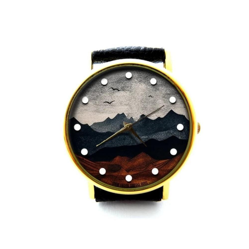 Unique Watch With Mountains on Dial and Genuine Leather Band: Unique Watch With Mountains on Dial and Genuine Leather Band Capture the spirit of adventure with this unique watch featuring a picturesque mountain scene on the dial. Paired with a genuine leather ba