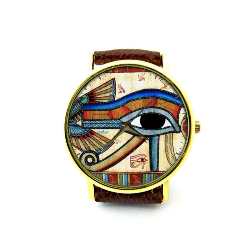 Unique Watch With Ancient Egypt Eye Photo on Dial and Genuine Leather Watch: Unique Watch With Ancient Egypt Eye Photo on Dial and Genuine Leather Watch Introducing our Unique Watch featuring a captivating Ancient Egypt Eye photo delicately captured on the dial, paired with a