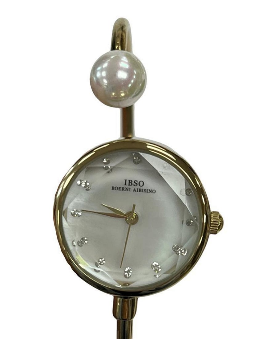 Women's Classy Bangle Watch With Pearl: Women's Classy Bangle Watch With Pearl Introducing the Women's Classy Bangle Watch With Pearl—a timeless accessory that effortlessly combines elegance with sophistication. This exquisite ti