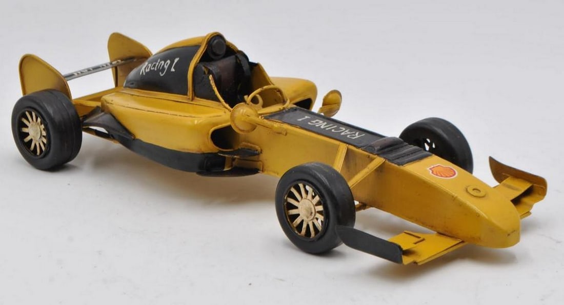 Rustic 2001 Ferrari F1 - Yellow & Black Trim Die Cast Metal Decor: Rustic 2001 Ferrari F1 - Yellow & Black Trim Die Cast Metal Decor Decorate any table, desk, or shelf with sporty elegance using our Rustic 2001 Ferrari F1 Sculpture. Featuring a rustic iron frame,