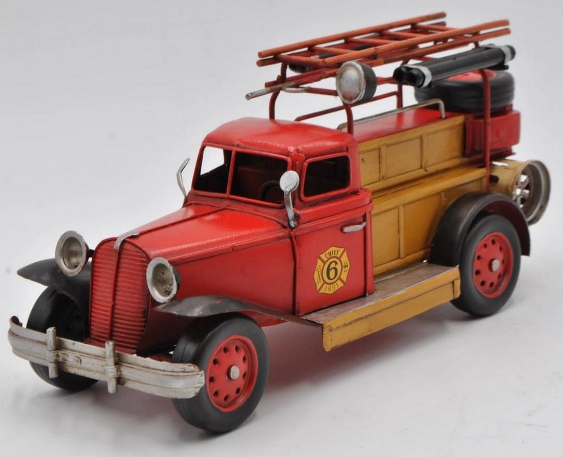 1931 Ford Model A Fire Chief Truck – Red Vintage Metal Replica: 1931 Ford Model A Fire Chief Truck – Red Vintage Metal Replica This handcrafted 1931 Fire Chief truck model is designed for display on a desk, table, or shelf. Featuring a rustic iron frame with a