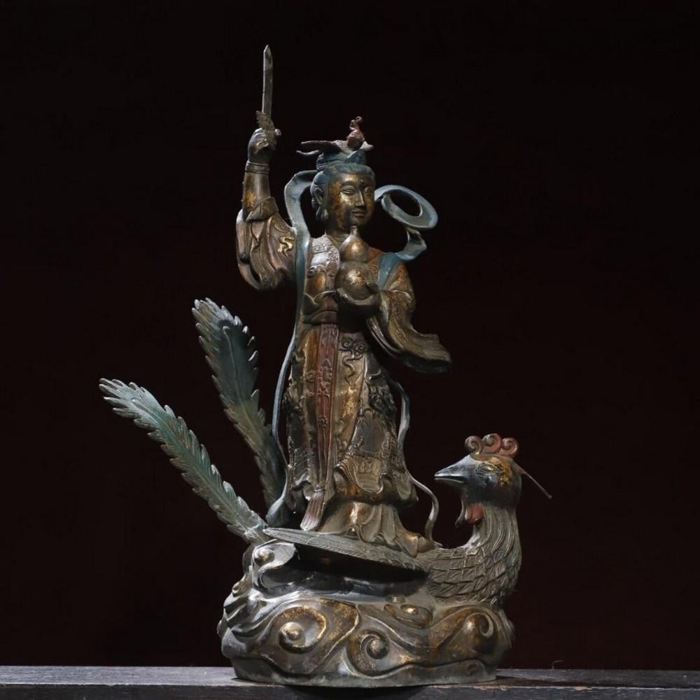 Gilded Copper Nine Heavens Mysterious Woman Buddha Statue: Gilded Copper Nine Heavens Mysterious Woman Buddha Statue This antique Buddha statue is a striking representation of divine grace and mystery, meticulously handcrafted from pure copper and adorned wi