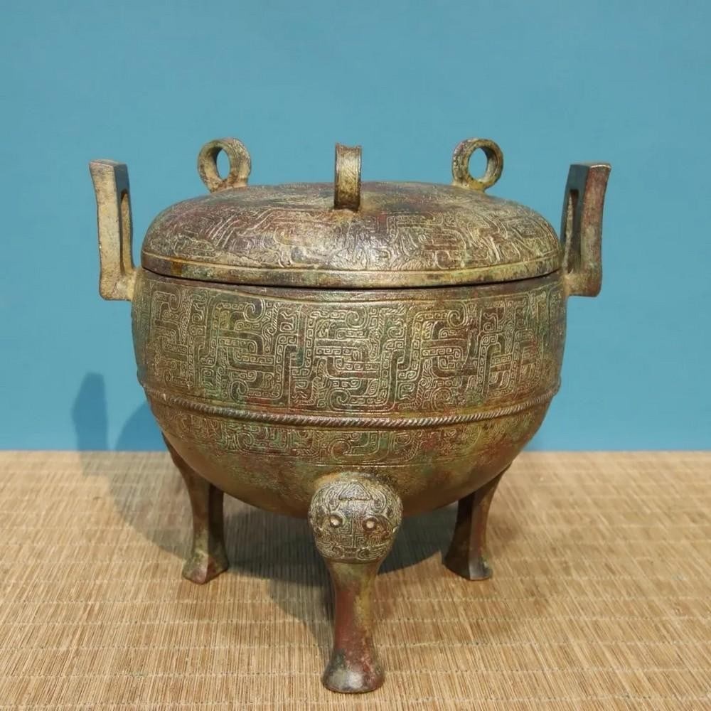 Antique Chinese Bronze Full-Handed Double-Eared Tripod Statue Ornament: Antique Chinese Bronze Full-Handed Double-Eared Tripod Statue Ornament This rare handcrafted bronze statue features a robust double-eared tripod design, with full-handed detailing that emphasizes str