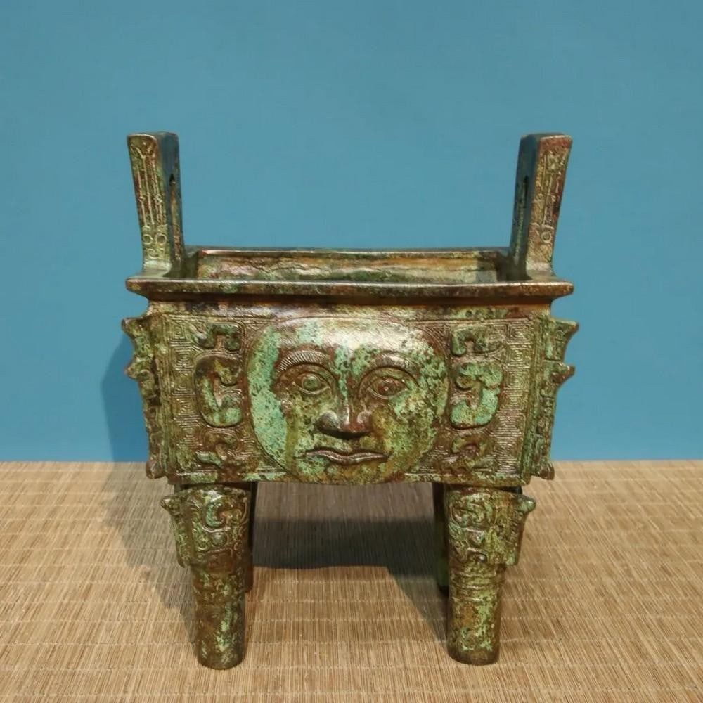 Antique Chinese Bronze Inscribed Human Face Square Tripod Ornament (1 of 8)