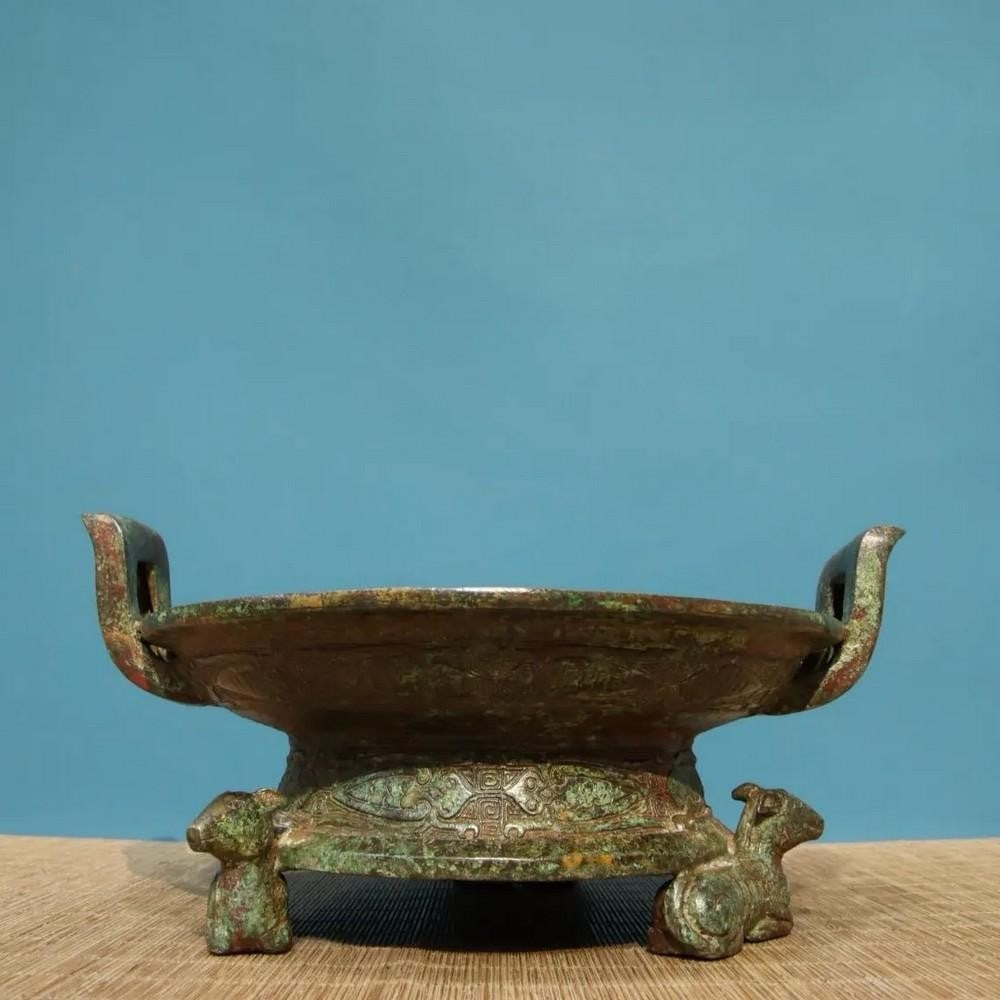 Antique Chinese Bronze Inscribed Sheep Foot Plate Statue Ornament: Antique Chinese Bronze Inscribed Sheep Foot Plate Statue Ornament This rare handcrafted bronze statue features a unique sheep foot plate design with intricate inscriptions, symbolizing prosperity, pro