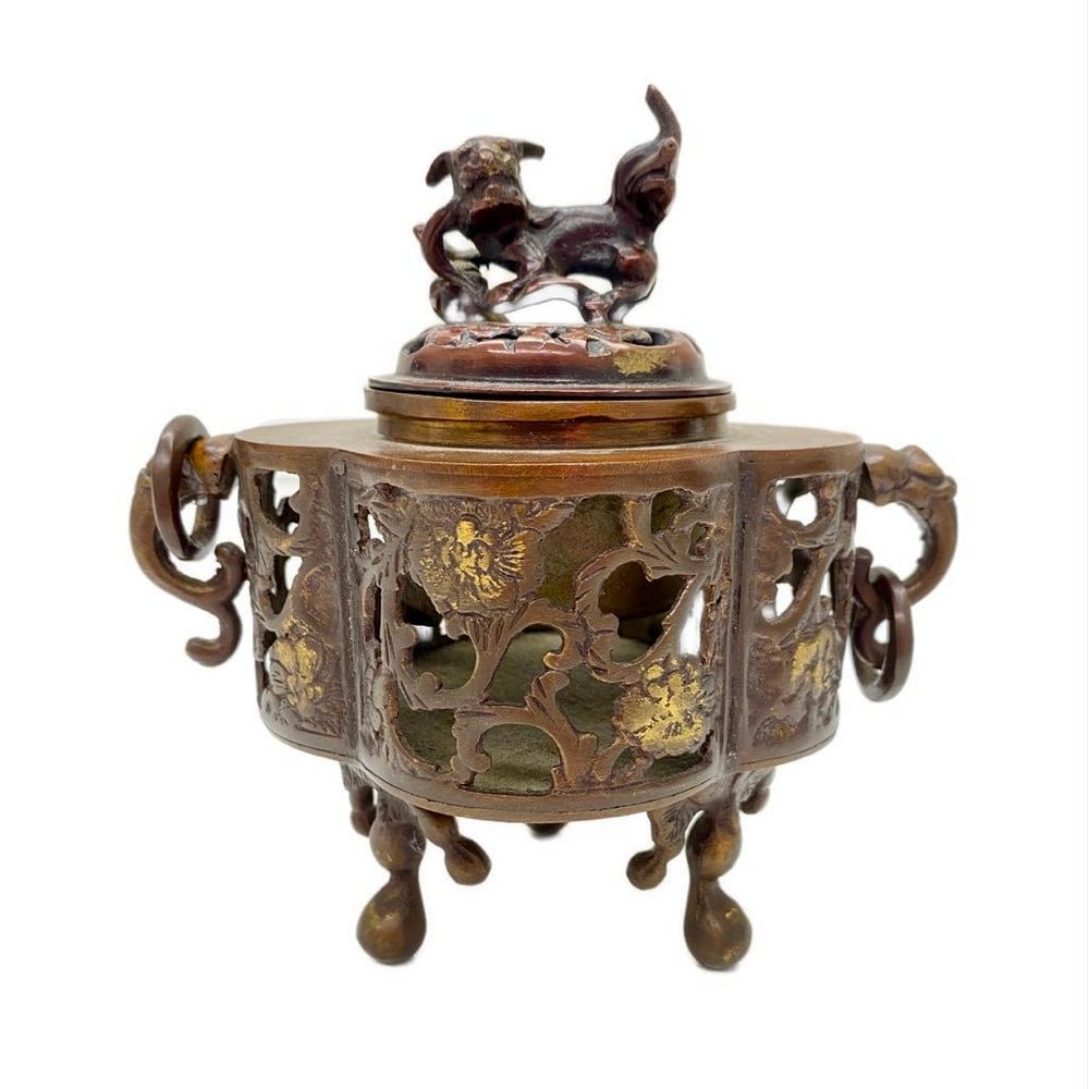 Beautiful Brass Floral Incense Burner: Beautiful Brass Floral Incense Burner Brass floral incense burner with a lid. Lid has a dog on the top. Decorated with flowers on each side. Three legs and two handles. View photos for further detai