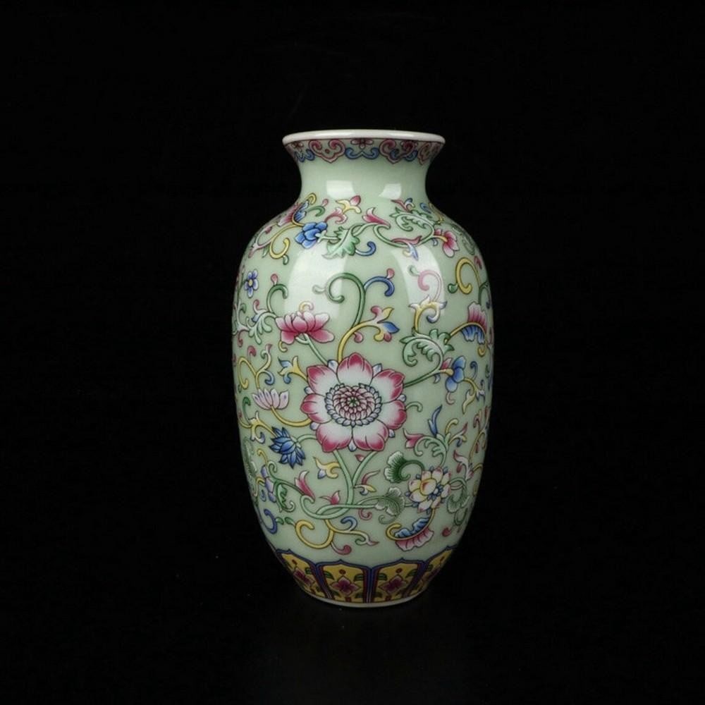 Rare Chinese Antique Plum Green Enamel Winter Melon Vase with Hand Painting: Rare Chinese Antique Plum Green Enamel Winter Melon Vase with Hand Painting This exquisite and rare winter melon-shaped vase features a rich plum green enamel finish, complemented by finely detailed