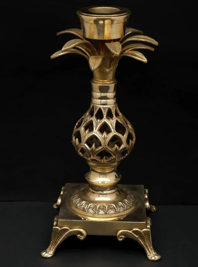 Brass Tree Design Candle Holder – 12": Brass Tree Design Candle Holder – 12" A 12.5-inch brass candle holder featuring a tree-inspired design with stylized branching forms. Crafted with balanced proportions and a symmetrical layout,