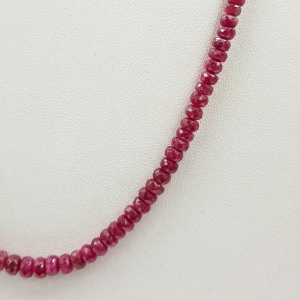 Ruby Faceted Bead String Necklace: Ruby Faceted Bead String Necklace Gemstone Diameter: 3.2mm - 4.6mm Length of Necklace: 45cm Weight in Carats: 78.68 View Photos For Further Details
