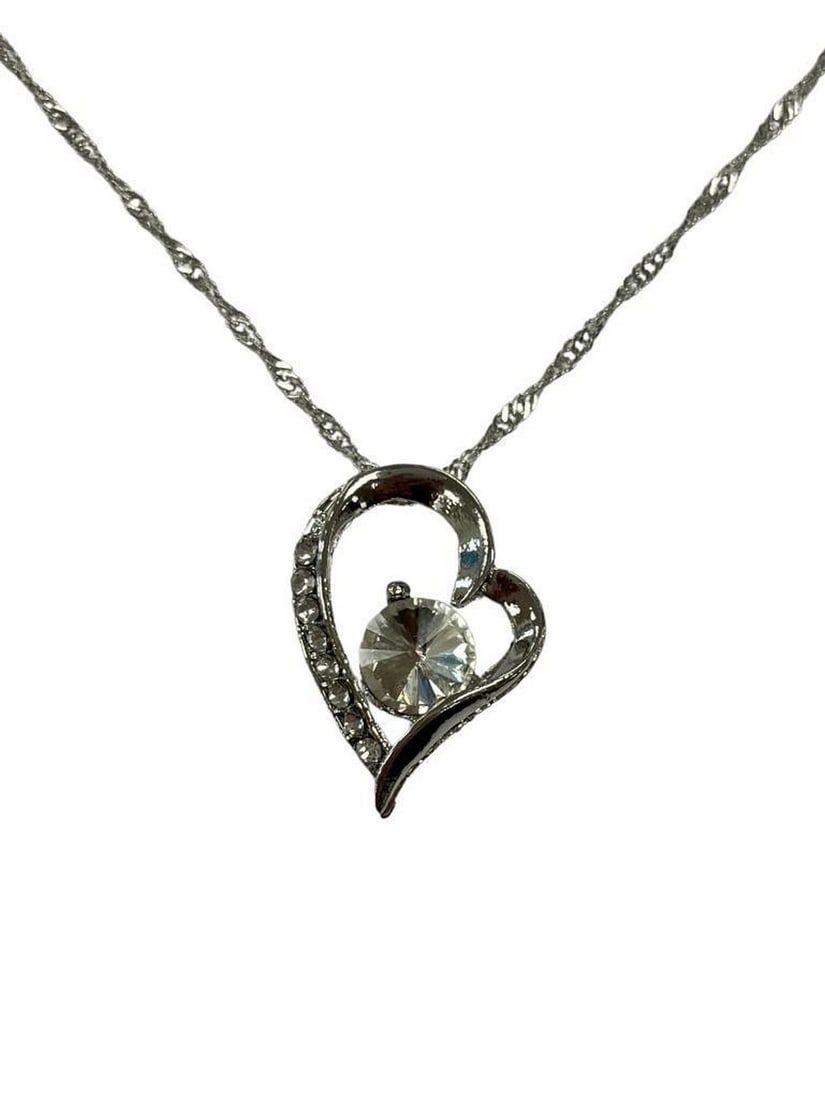 Sterling Silver Rhinestone Heart Pendant Paired With 925 Twist Link Necklace: Sterling Silver Rhinestone Heart Pendant Paired With 925 Twist Link Necklace. This Simple Yet Elegant Heart Shaped Pendant Necklace Will Be Sure To Bring Some Sparkle To Your Everyday. This Eye-Catch