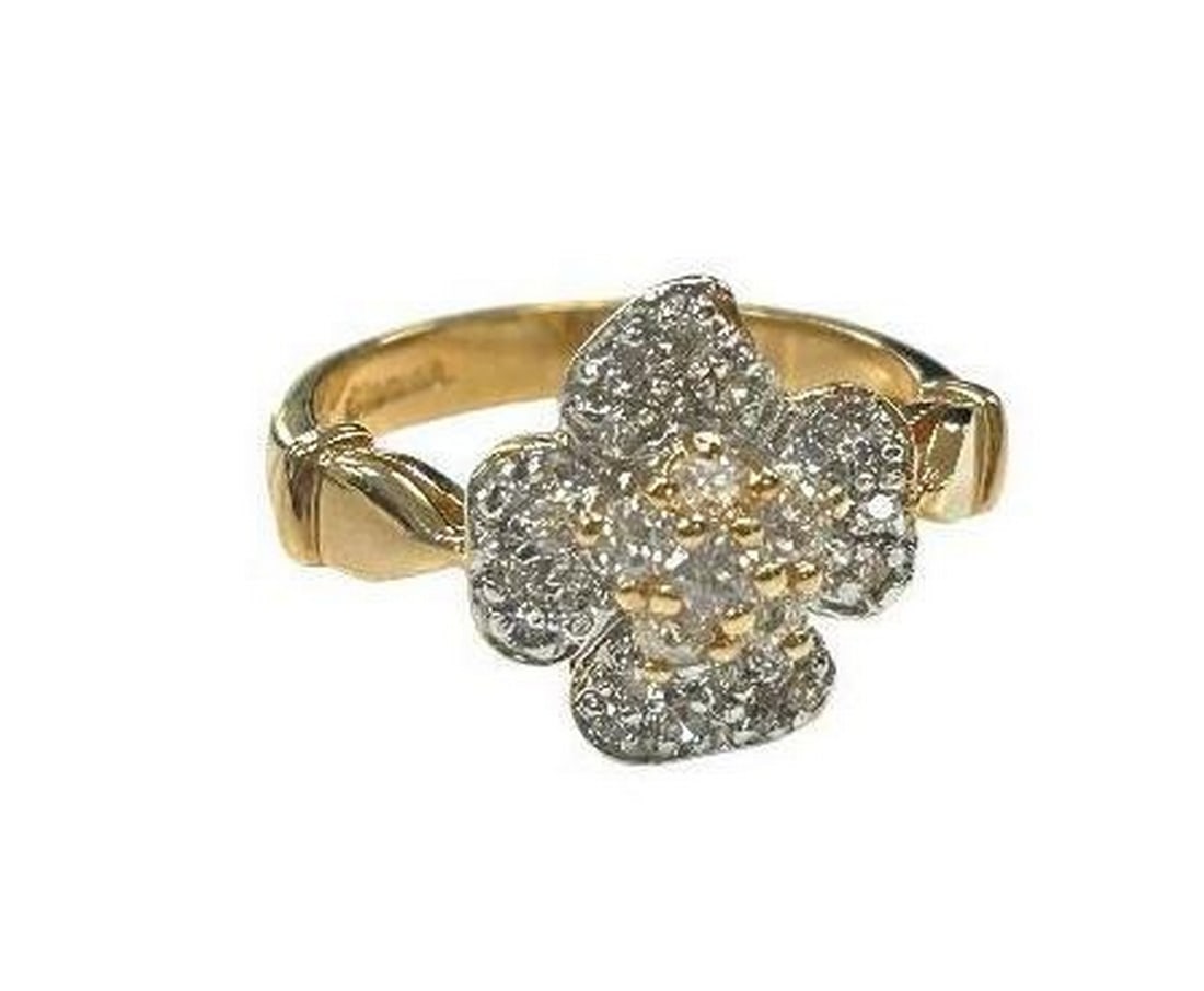 Size 8 Yellow Gold 18KTGP White Swarovski Crystal Flower Ring: Size 8 Yellow Gold 18KTGP White Swarovski Crystal Flower Ring This ring features a beautiful 4 petal flower design, adorned with glistening White Swarovski crystals that effortlessly catch the light,