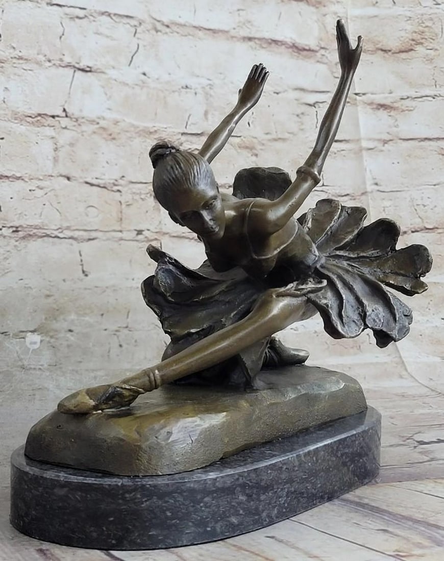 Ballerina Bronze Sculpture: Ballerina Bronze Sculpture This is a captivating bronze study of the beautiful young ballet dancer. When you look over the sculpture and the depth and warmth of the patina meet your eye, it sends a s