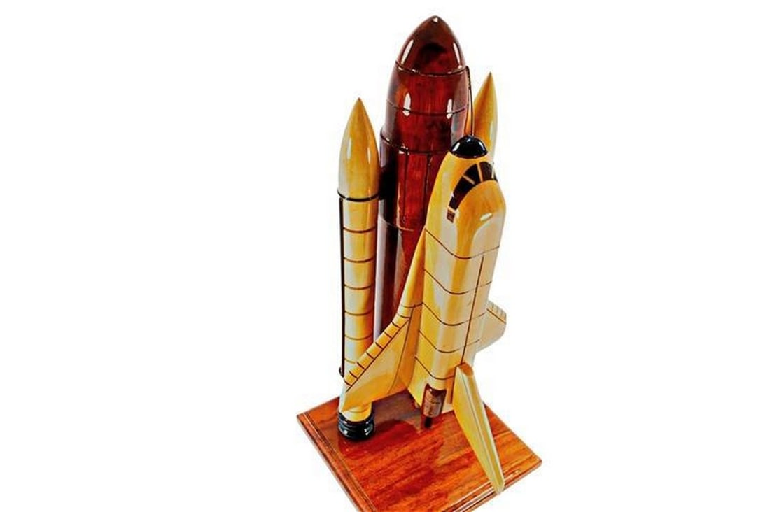 Wood Handcrafted NASA Space Shuttle: Wood Handcrafted NASA Space Shuttle Beautifully handcrafted and finished with glistening polyurethane, this finely detailed model of the NASA Space Shuttle, made from rich mahogany wood, mounted