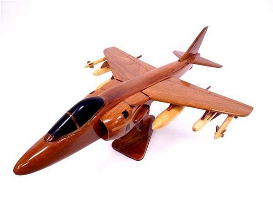 AV8 Harrier Wooden Plane Model: AV8 Harrier Wooden Plane Model Elevate your admiration for aviation innovation with the AV-8 Harrier Handcrafted Scale Model, a stunning replica that captures the essence of this remarkable jet. Meti