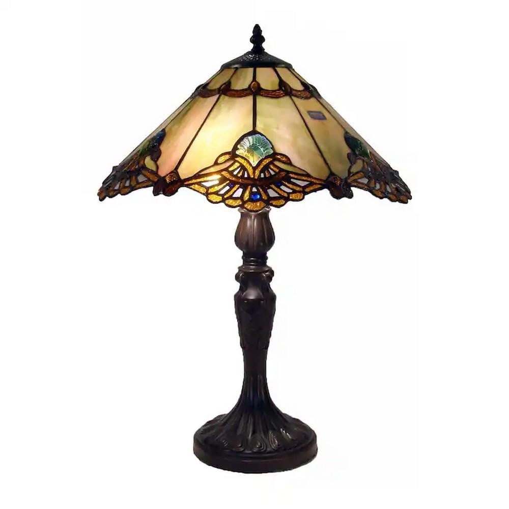 Vintage Courtesan Tiffany Inspired Lamp: Vintage Courtesan Tiffany Inspired Lamp The Tiffany Courtesan table lamp is a stunning and practical addition to any room. Its shade is meticulously crafted from 342 hand-cut stained glass pieces, ea