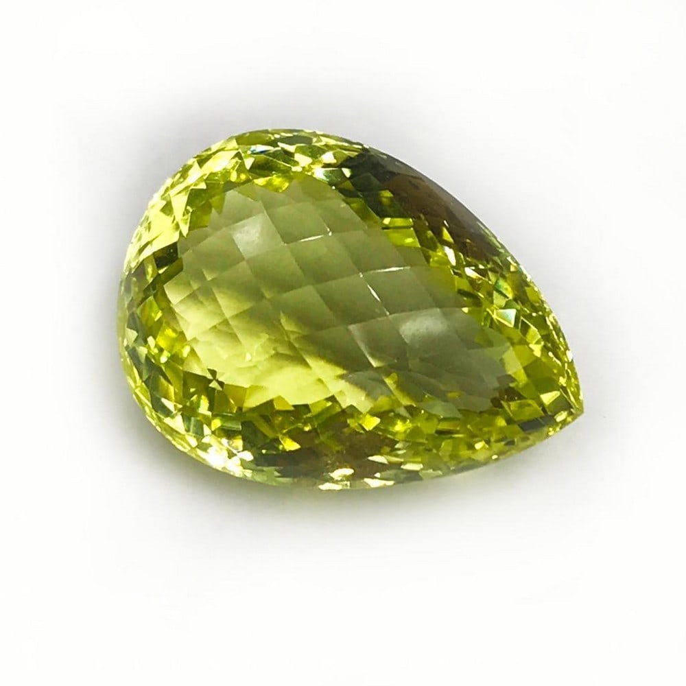 45.24ct Lovely Lemon quartz Pear Briolet Gemstone: Lovely Lemon quartz Pear Briolet Cheery and bright this gem is believed to aid in the building, concentration, and magnification of one's thoughts and knowledge. Size- 28x20 mm, Weight- 45.24