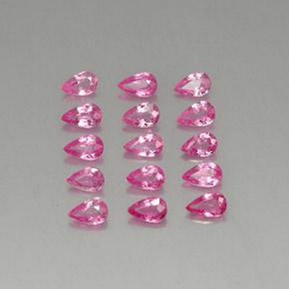 3ct Pear Cut Dark Pink Sapphires: 3ct Pear Cut Dark Pink Sapphires This lot contains 15 pear cut Sapphire stones, each at 0.24ct Raw Dimension: 4.7 x 3.1 x 2mm Total Carat Weight: 3.58ct Treated: Yes. Heat treated to