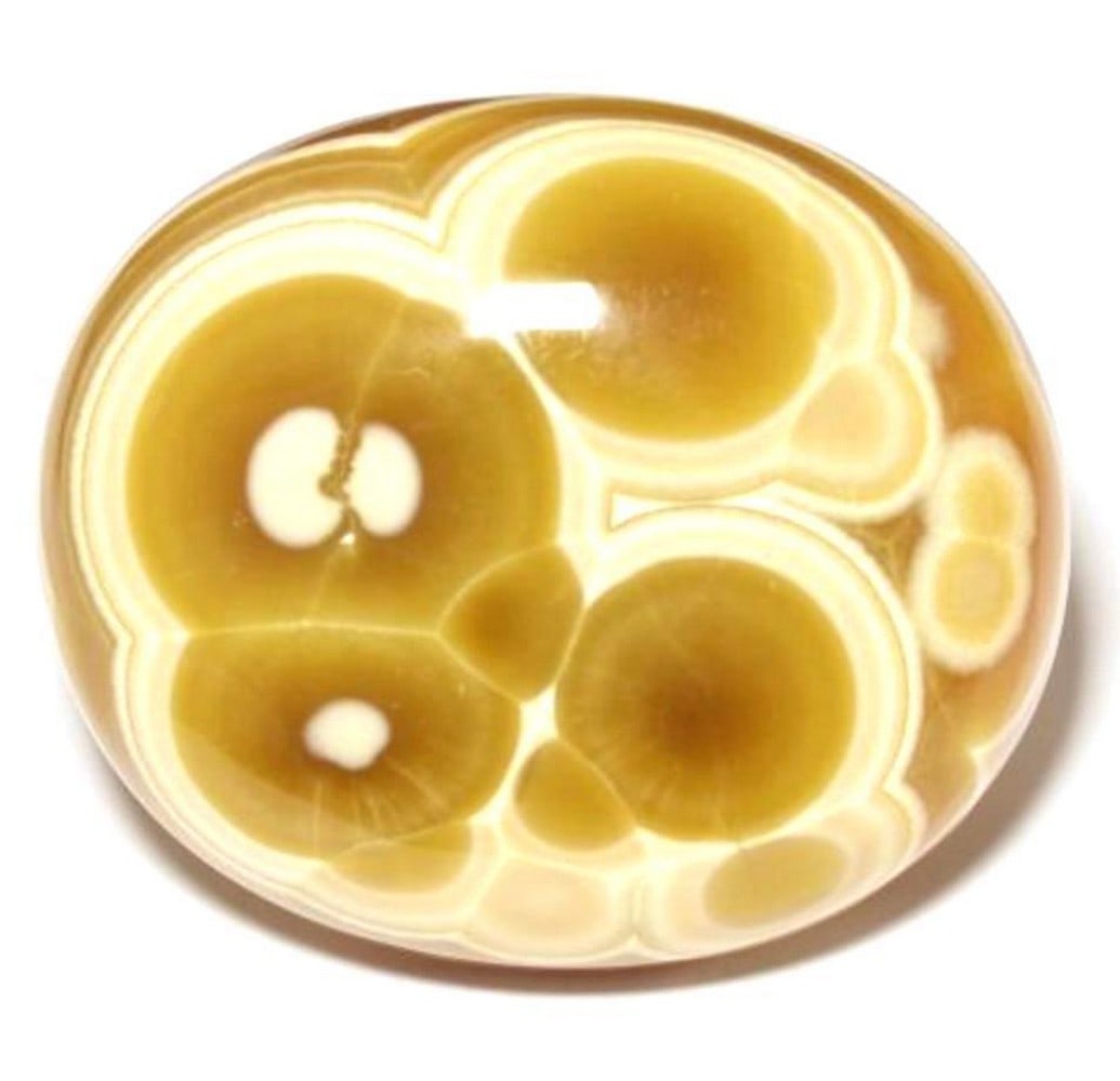 96.8ct Oval Golden Multicolour Agate Gemstone: 96.8ct Oval Golden Multicolour Agate Gemstone Size: 32.28 x 27.5 x 12.68 mm Colour: Multicolour Clarity: Opaque Untreated Origin: Indonesia Mohs Hardness: 6.5-7 View Photos For Further Details